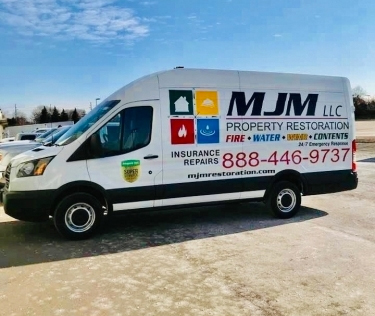 MJM Property Restoration van